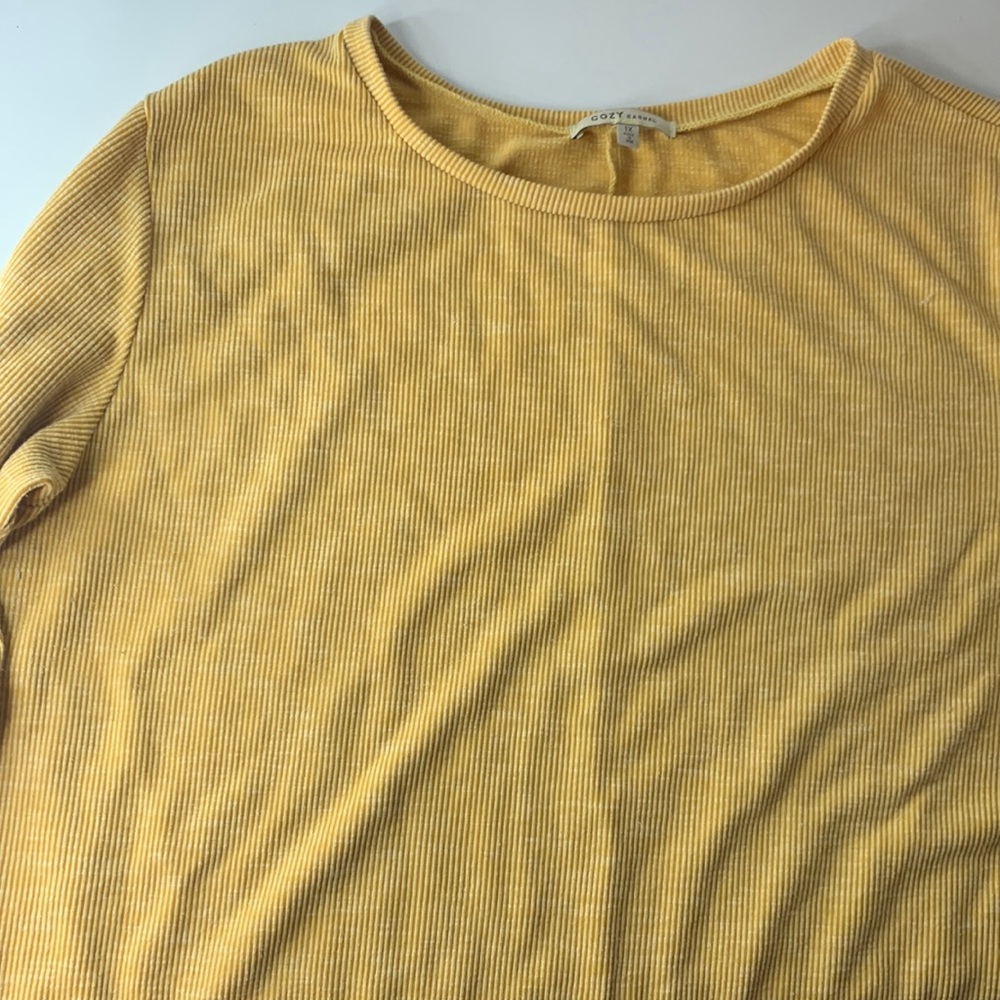 yellow long sleeve shirt